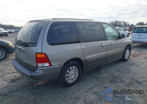 2001 Ford Windstar Limited z USA, uszkodzony, nr VIN 2FMDA584X1BB06423